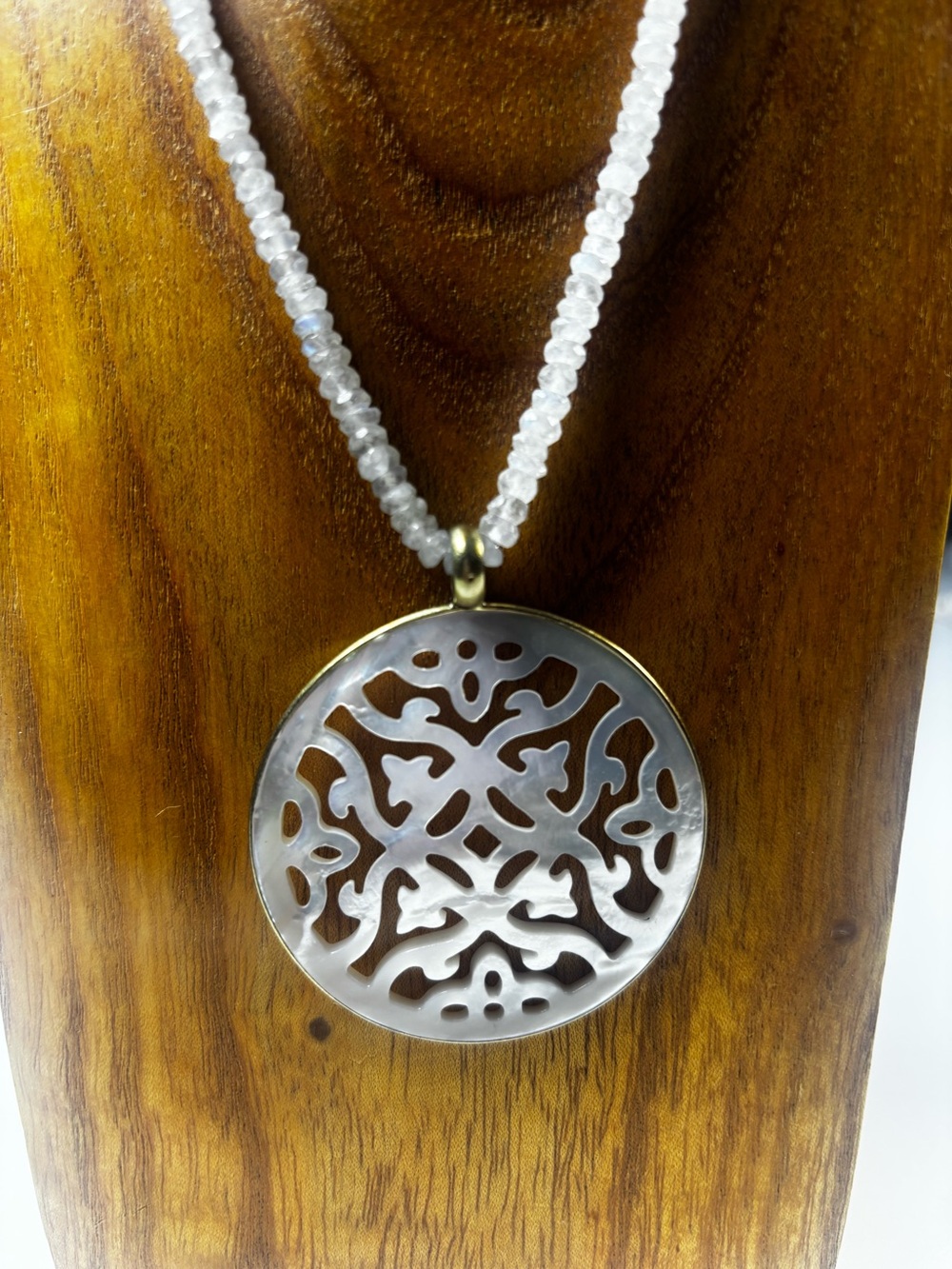 Mother-of-Pearl Filigree Pendant w/Moonstone necklace. Leo Fasseas Jewelers.